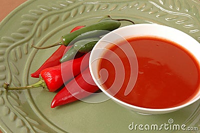 Hot Sauce with Peppers Stock Photo