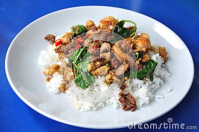 Hot and spicy pork with basil Stock Photo