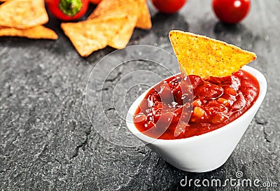 Hot spicy salsa sauce with corn tortillas Stock Photo