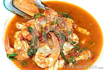 Hot and spicy sour seafood soup Stock Photo