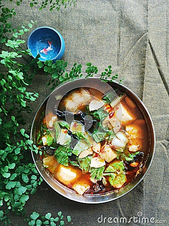 Hot and spicy Szechuan hot pot fish soup Stock Photo