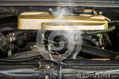 Hot steam coming out of Radiator, Car engine over heat Stock Photo