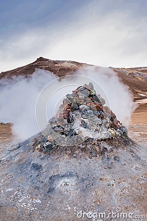 Hot sulfuric steam vent spewing sulfur steam in the hot sulfuric in Myvatn Stock Photo