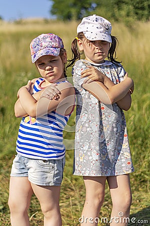 Hot Summer. Two little girl posing for the camera Stock Photo