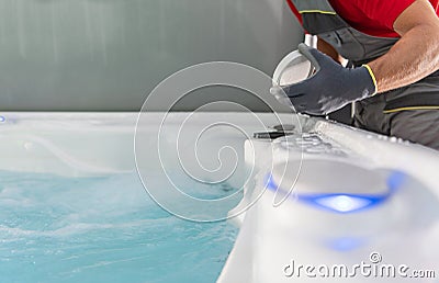 Hot Tub SPA Technician Checking on Jacuzzi Filter Stock Photo