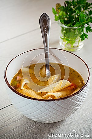 hot vegetable soup with large pasta in a bowl Stock Photo