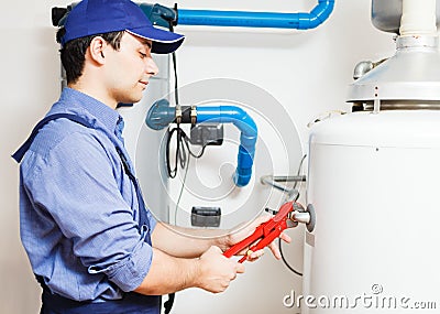 Hot-water heater service Stock Photo