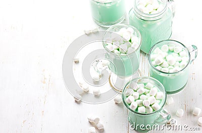 Hot white mint chocolate with marshmallows, white background. Holidey drink Stock Photo