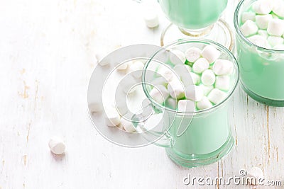 Hot white mint chocolate with marshmallows, white background. Holidey drink Stock Photo