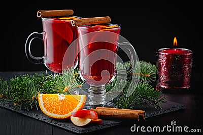 Hot wine for winter and Christmas with delicious orange and spices Stock Photo