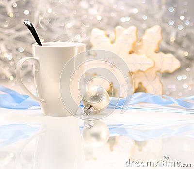 Hot winter drink with sugar cookies Stock Photo