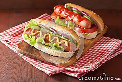 Hotdog with ketchup mustard and vegetables Stock Photo