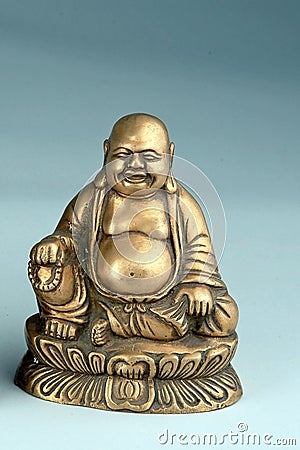 Hotei Laughing Buddha brass statue Stock Photo