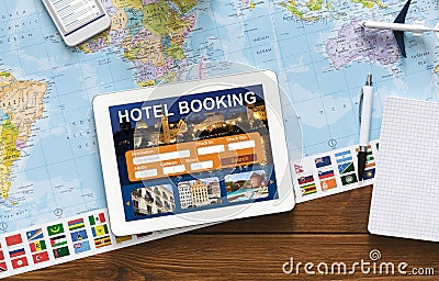Tablet With Hotel Booking Application Lying On Desk, Collage, Above-View Stock Photo