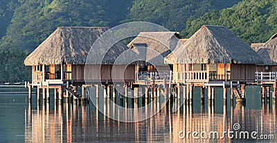 Hotel bungalows over Moorea lagoon Stock Photo