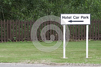 Hotel car park sign direction arrow Stock Photo
