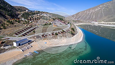 Hotel complex on the shore of Lake Kezenoy am. Chechen Republic. Russia Editorial Stock Photo