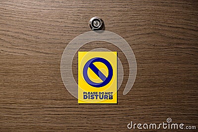 Hotel do not distrub magnet cards hanging signs on the wooden do Editorial Stock Photo