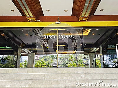 Hotel Entrance Door, Welcome sign Mido hotel, Bangkok Stock Photo