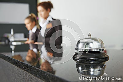 Hotel reception with bell Stock Photo