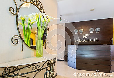 The hotel reception with desk and clocks Editorial Stock Photo