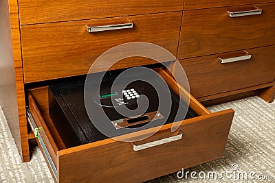 Hotel room safe for storing valuables Stock Photo