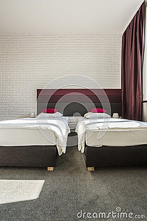 Hotel room with two single beds Stock Photo