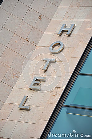 Hotel sign on a building in Italy Stock Photo