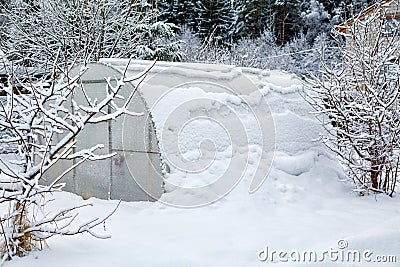 Hothouse brought by snow Stock Photo