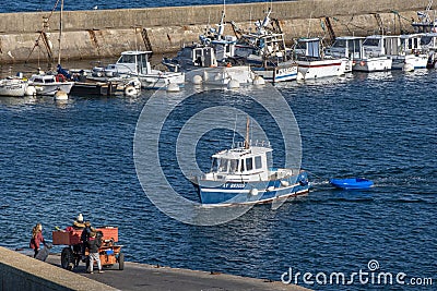 Local life in the port of the Saint-Gildas-Houat Port in Houat Island. Brittany, France Editorial Stock Photo