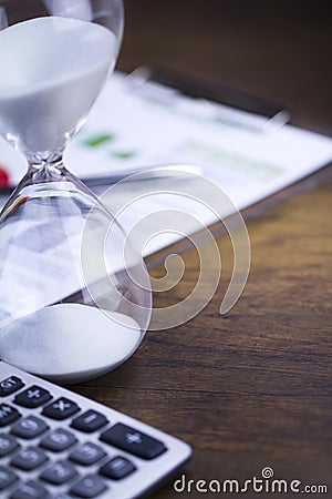 Hour glass presenting time concept Stock Photo