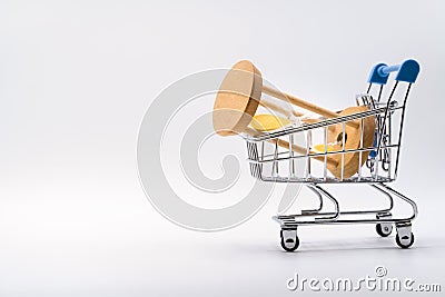 Hourglass in shopping cart on white background Stock Photo