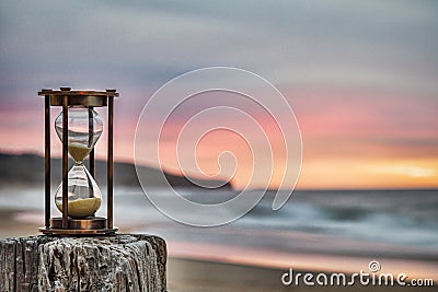 Hourglass on Beach Stock Photo