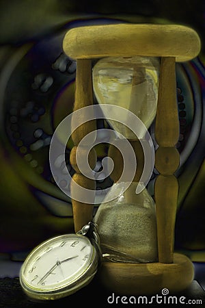 Hourglass and clock. Night time Stock Photo