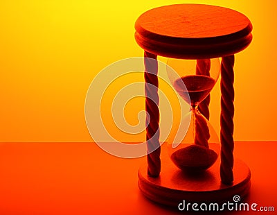 Hourglass in gold light Stock Photo