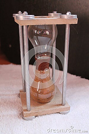 Hourglass on metal stand Stock Photo