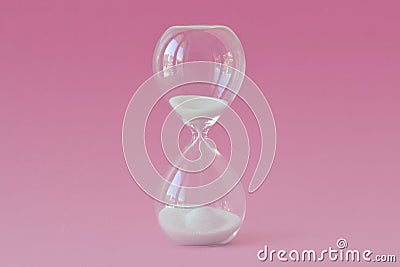 Hourglass on pink background - Concept of health, fertility and biological clock in women Stock Photo