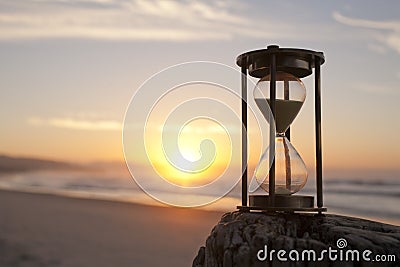 Hourglass Sand Timer Beach Sunrise Stock Photo