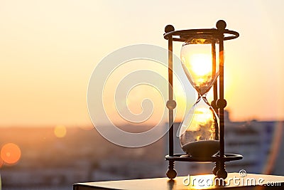Hourglass at sunset Stock Photo