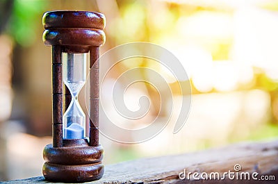 Hourglass time passing concept for business deadline, urgency and running out of time Stock Photo