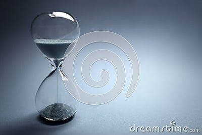 Hourglass time passing Stock Photo