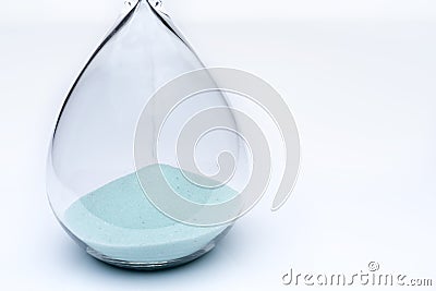 Hourglass on white background. Sand falls inside the flask. Stock Photo