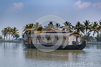 House boat sailing through Kerala backwaters Stock Photo