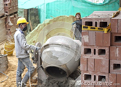 House builder (bricklayer) at work Stock Photo