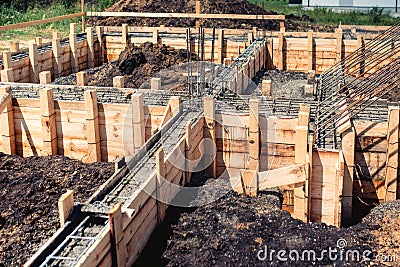 House building construction site, foundation and cement pouring Stock Photo