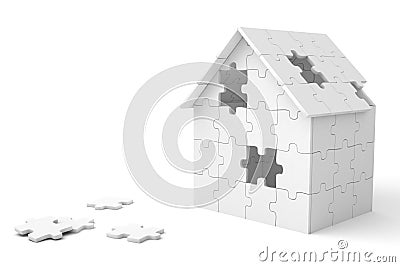 House built out of puzzle pieces Stock Photo