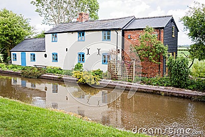 House on a Canal Stock Photo