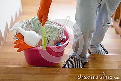 House cleaning service and Man cleaning house concept. Stock Photo