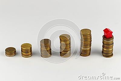 House and coins stack, realestate concept Stock Photo