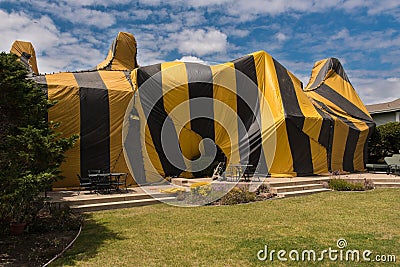 House is covered by tent for fumigation Stock Photo